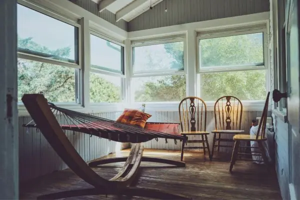 covered porch style with furniture