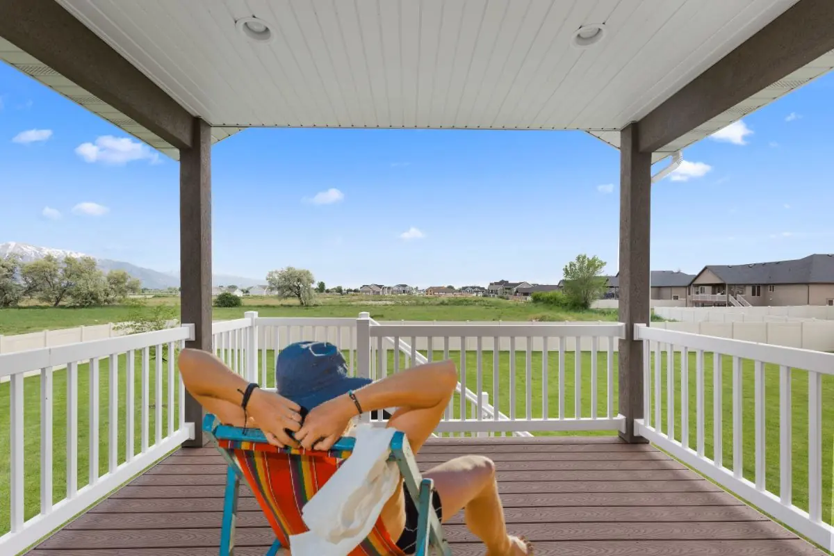 covered patio and deck of new home