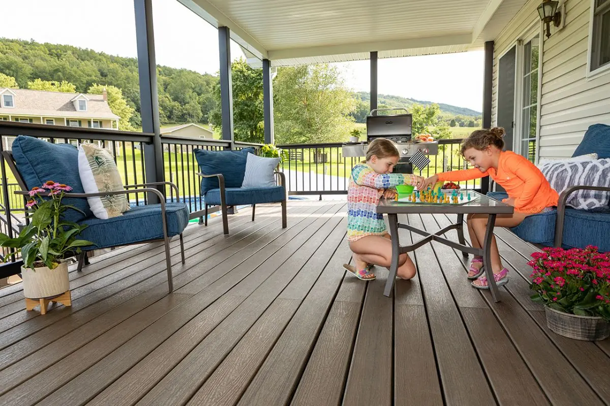 children enjoying playing on wooden porch